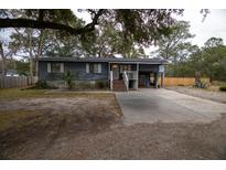 Ranch style home with carport and fenced yard at 1905 Central Park Rd # B, Charleston, SC 29412