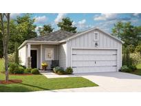 One-story home with gray siding, white garage door, and landscaping at 218 Pine Crest View Dr, Summerville, SC 29486