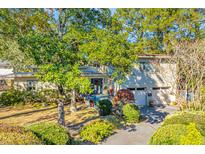 Attractive ranch home with mature landscaping and two-car garage at 46 Chadwick Dr, Charleston, SC 29407