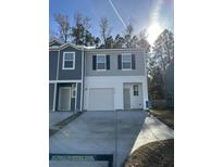 Charming two-story home with a one-car garage and a paved driveway at 1101 Scarlett Maple St, Summerville, SC 29486