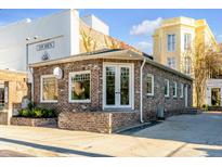 Charming brick commercial building with large windows, perfect for a business at 278 Meeting St, Charleston, SC 29401