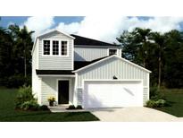 Two-story house with light gray siding, white trim, and a two-car garage at 302 Tiliwa St, Summerville, SC 29486