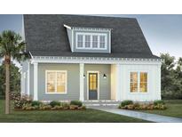 Charming two-story home with gray siding, white trim, and a covered porch at 347 Trailmore Ln, Summerville, SC 29486