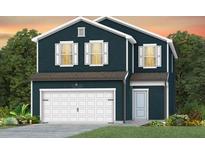 Two-story home with dark siding, white garage door, and landscaping at 751 Meadowbrook Ln, Summerville, SC 29486