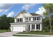 Two-story house with neutral siding, gray roof, and attached garage at 763 Maynard Ln, Summerville, SC 29486