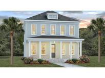 Two-story house with gray siding, white trim, and a front porch at 825 Gentle Breeze Dr, Summerville, SC 29486
