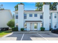 Light blue two-story home with parking and landscaping at 195 Pine Shadow Dr, Goose Creek, SC 29445