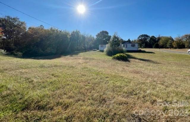 Photo one of 4900 E Nc 27 Hwy Iron Station NC 28080 | MLS 4082229
