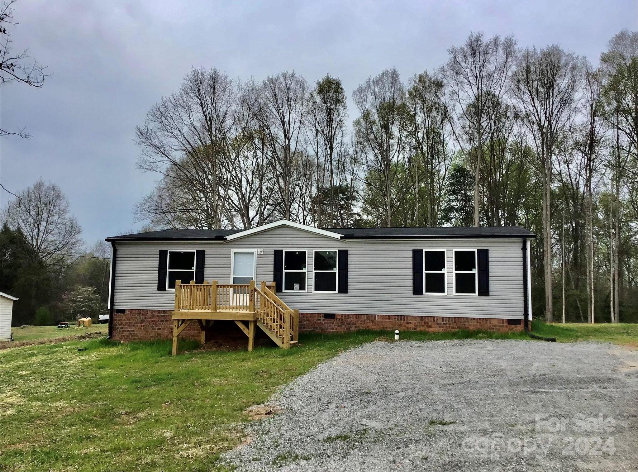 Photo one of 222 Gravel Hill Ct Taylorsville NC 28681 | MLS 4125666