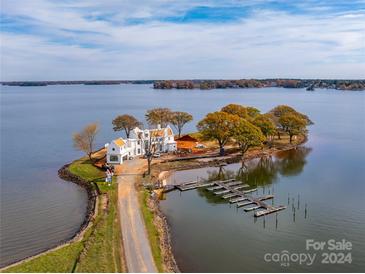 Luxury waterfront home with private dock and stunning lake views at 8397 Ranger Island Marina Rd, Denver, NC 28037