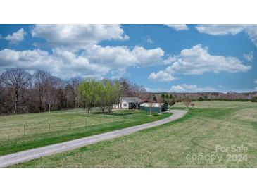 Photo one of 1495 Old Charlotte Rd Taylorsville NC 28681 | MLS 4116279
