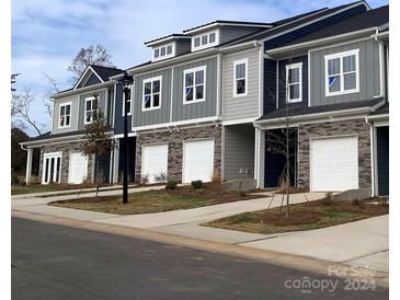 Exterior view of townhouses with attached garages at 2791 Ruby Mill Dr # 38, Gastonia, NC 28056