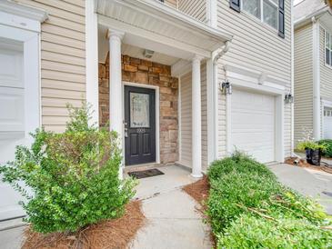 Townhouse front entry with stone accents at 1905 Travertine Ln, Fort Mill, SC 29708