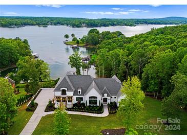 Luxury waterfront home with expansive lake views and private dock at 18304 Rosapenny Rd, Charlotte, NC 28278