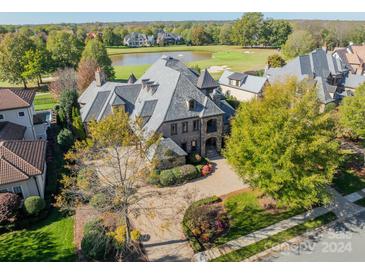 Luxury home on golf course with large lot and mature trees at 300 Eagle Bend Dr, Waxhaw, NC 28173