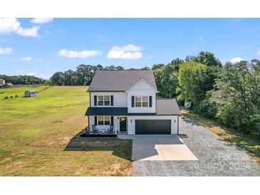 Photo one of 2126 Mills Harris Rd Wingate NC 28174 | MLS 4174567