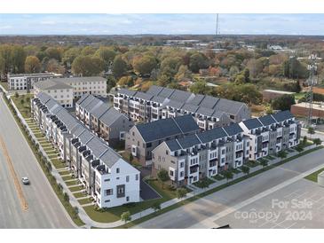 Aerial view of a community with multiple townhouses at 451 Blairhill Rd # 4, Charlotte, NC 28217