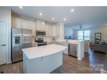 Modern kitchen with stainless steel appliances and an island at 5013 Patton Dr, Gastonia, NC 28056