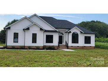 Photo one of 5521 Harvest Hills Rd Bessemer City NC 28016 | MLS 4178554