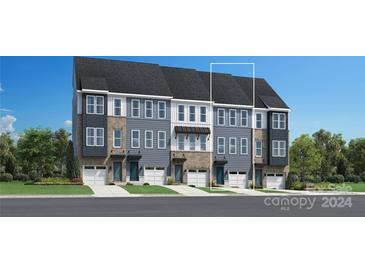 Modern three-story townhome with attached garage and attractive curb appeal at 1336 Hamilton St # 2, Charlotte, NC 28206