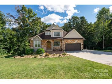 Two-story house with stone accents and landscaping at 1936 46Th Avenue Ne Dr, Hickory, NC 28601