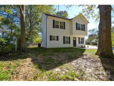 Two story white house with black shutters at 1713 4Th Ave, Gastonia, NC 28052