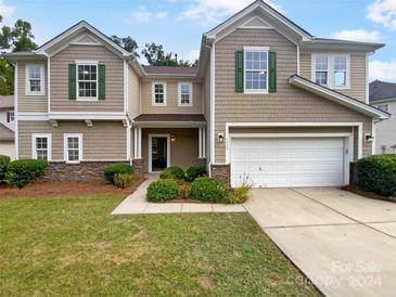 Two story house with a large two car garage at 4608 Brookwood Rd, Charlotte, NC 28215