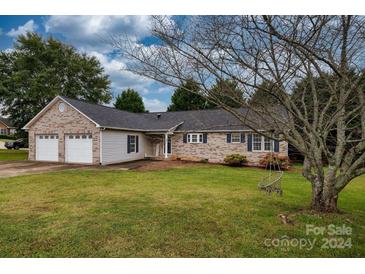 Brick ranch house with a two-car garage at 2707 24Th Street Ne Ct, Hickory, NC 28601