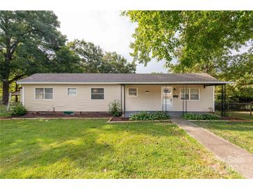 Ranch home with a covered porch and well-maintained lawn at 123 Sunset Dr # 273, Clover, SC 29710