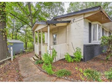 Small house with a porch and a yard at 519 S Mulberry St, Cherryville, NC 28021