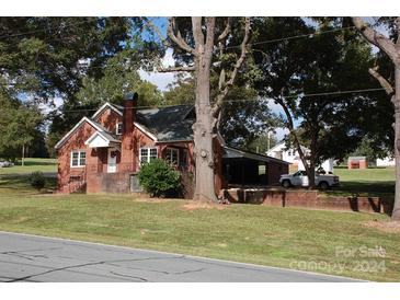 Brick ranch house with carport and large yard at 2124 W Main St # C, Albemarle, NC 28001