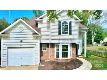 Two-story house with attached garage and landscaping at 818 Bradberry Ln, Indian Trail, NC 28079