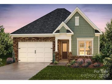 Two-story craftsman style home with stone and shingle accents at 3865 Maxwell Henry Nw Ln, Conover, NC 28613