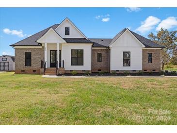 Photo one of 5513 Harvest Hills Rd Bessemer City NC 28016 | MLS 4194743