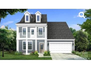 Two-story house with gray siding, white trim, and a two-car garage at 248 Supernova Dr, York, SC 29745