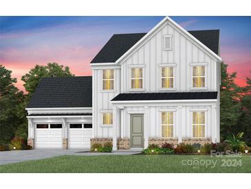 Two-story farmhouse-style home with two-car garage at 2237 Millennium Dr # 012, Lancaster, SC 29720