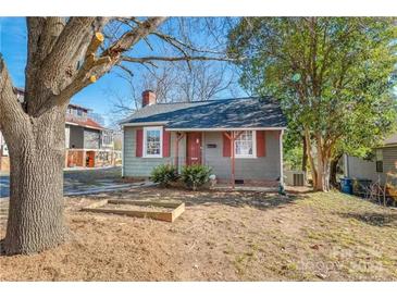 Gray house with red shutters, stone pathway, and small yard at 215 7Th Se St, Hickory, NC 28602