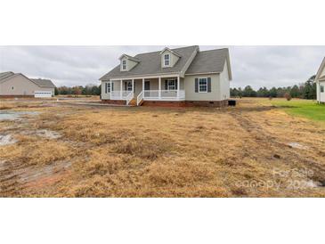 Newly constructed home with front porch and landscaping at 310 Genell Ln, Rock Hill, SC 29730