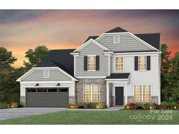 Two-story house with gray siding at 2217 Millennium Dr # 16, Lancaster, SC 29720