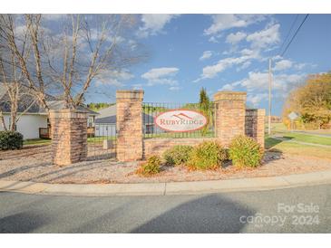 Stone entryway sign welcomes residents to the RubyRidge community at 159 Rubys Way # 35, Oakboro, NC 28129