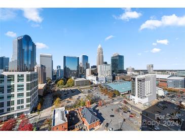 Aerial view of city skyline, showcasing the building's location and urban surroundings at 222 S Caldwell St # 1803, Charlotte, NC 28202