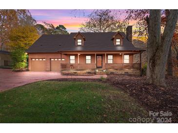 Charming one-story house with a two-car garage and a cozy front porch at 325 Fairfield Ct, Mount Gilead, NC 27306