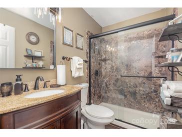 Updated bathroom with granite vanity and large walk-in shower at 4632 Hampton Chase Sw Dr # 20, Concord, NC 28027