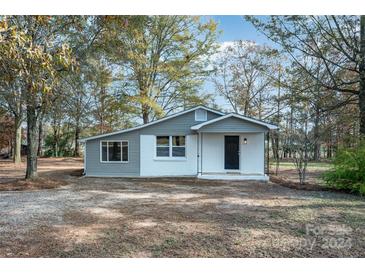 Newly renovated gray house with white accents, offering curb appeal at 129 Doster Rd, Lancaster, SC 29720