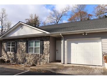 Cozy stone exterior with attached garage and landscaping at 194 E Jay Dr # 3, Taylorsville, NC 28681