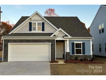 Two-story Craftsman style home with stone accents and a two-car garage at 3306 Mitchem Rd # 10, Ranlo, NC 28505