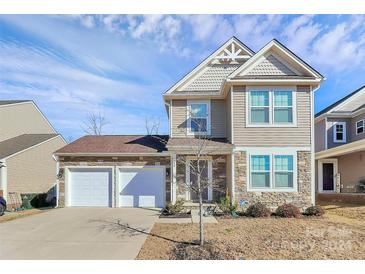 Two-story house with stone accents and a two-car garage at 980 Von Buren Blvd, Rock Hill, SC 29730