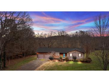 Charming home at sunset nestled among trees at 101 Stonehenge Ln, Statesville, NC 28625