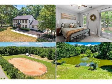 Stunning property with a main house, riding arena, and pond at 9552 Man O War Rd, Indian Land, SC 29707