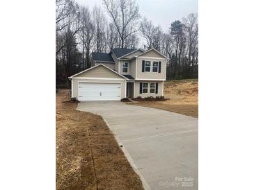 Two-story house with attached garage and driveway at 132 Crown Ct, Kings Mountain, NC 28086